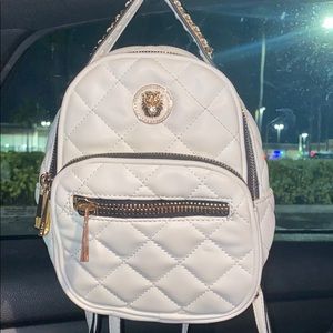 Limited addition white Aldo mini book bag